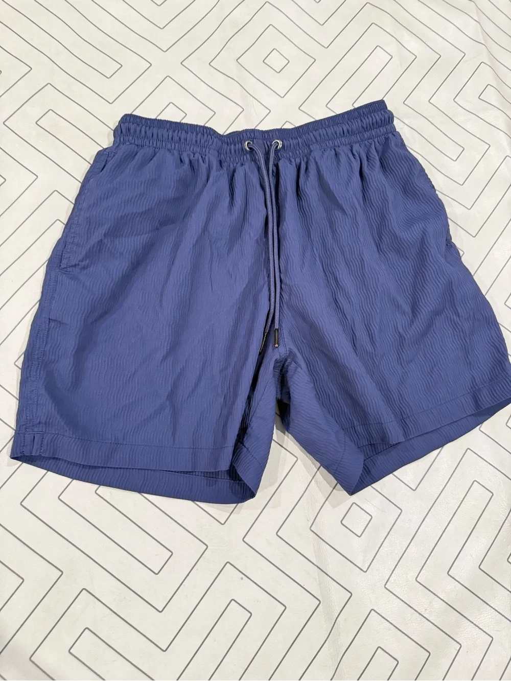 Chubbies Blue Textured Swim Trunks